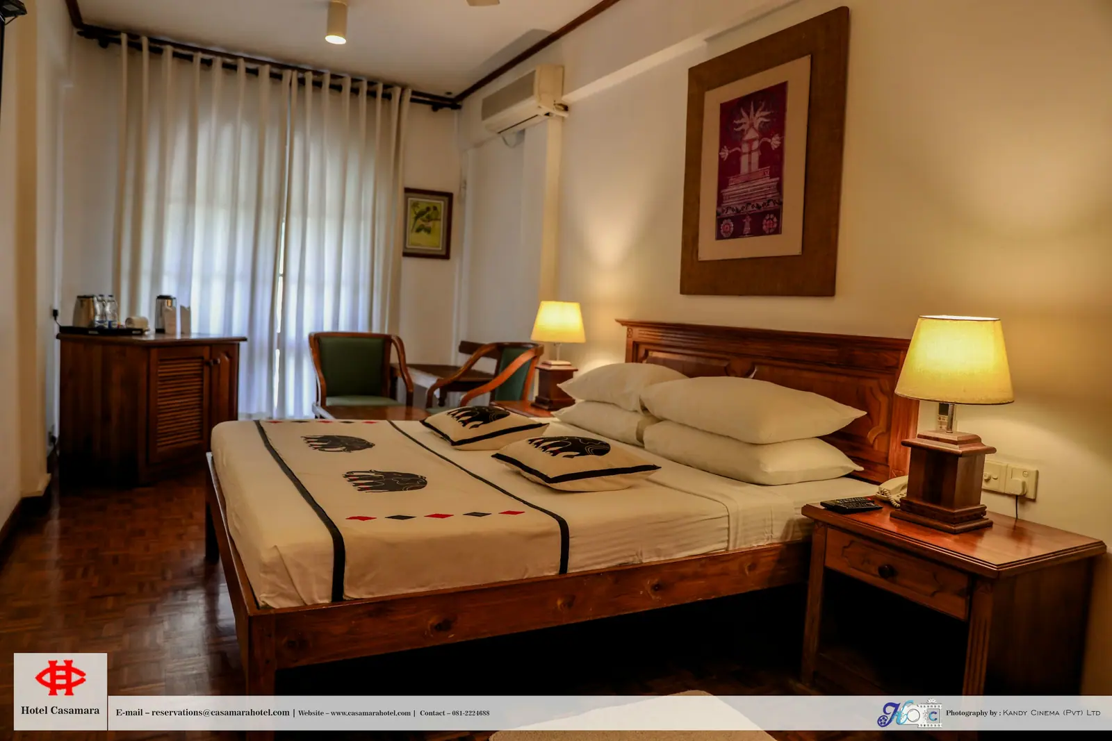 Representative image: a hotel room with a bed and a desk